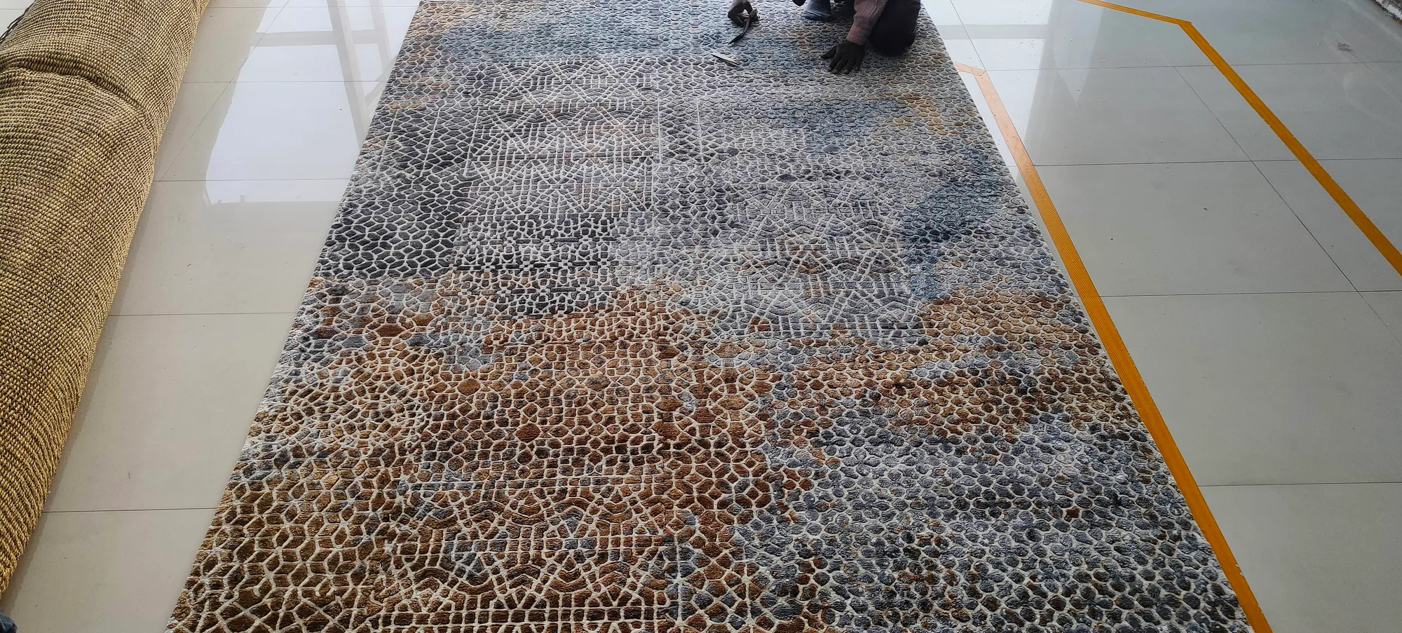 Skilled artisans at Pihue Creations, an Indian rug maker, craft beautiful rugs from wool, silk, jute, and sisal.